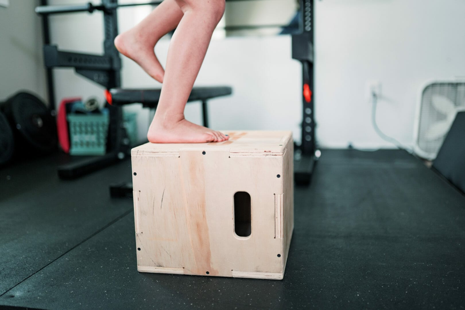 Boy doing box jump