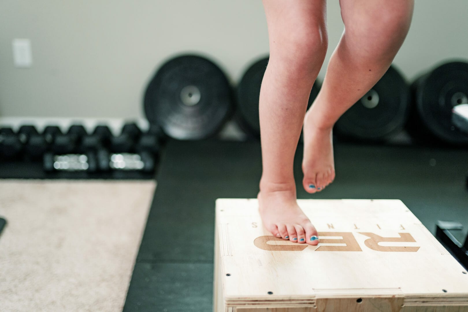 Kid doing box jump